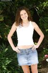 Slim Smooth Skinned Amber Simpson Poses Outdoors In