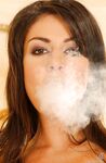 Brunette Chick In Fishnets Lucy Lee Is Smoking
