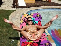 Anita Bellini Relaxing By The Pool Is Joined