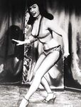 Dark Haired Retro Lingerie Model Bettie Page Shows