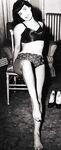 Dark Haired Retro Lingerie Model Bettie Page Shows