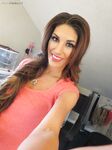 Busty Babe August Ames Strips And Poses Her