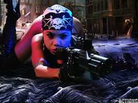Exotic Action Babe With Gun Genevive Valente Poses