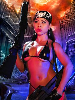 Exotic Action Babe With Gun Genevive Valente Poses